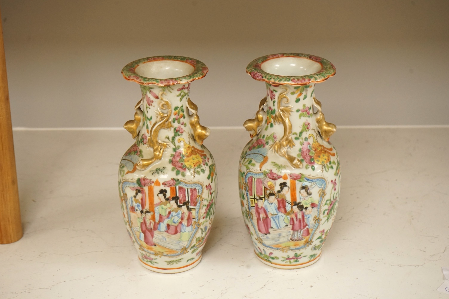 A pair of 19th century Chinese famille rose vases, 24cm